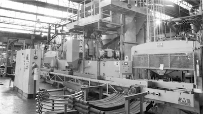 Stress peening de molas de lâmina parabólicas